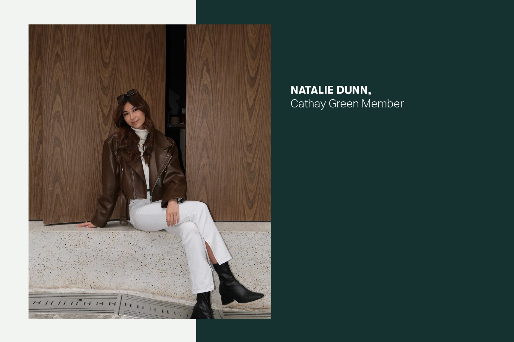 Natalie Dunn seated indoors and smiling.